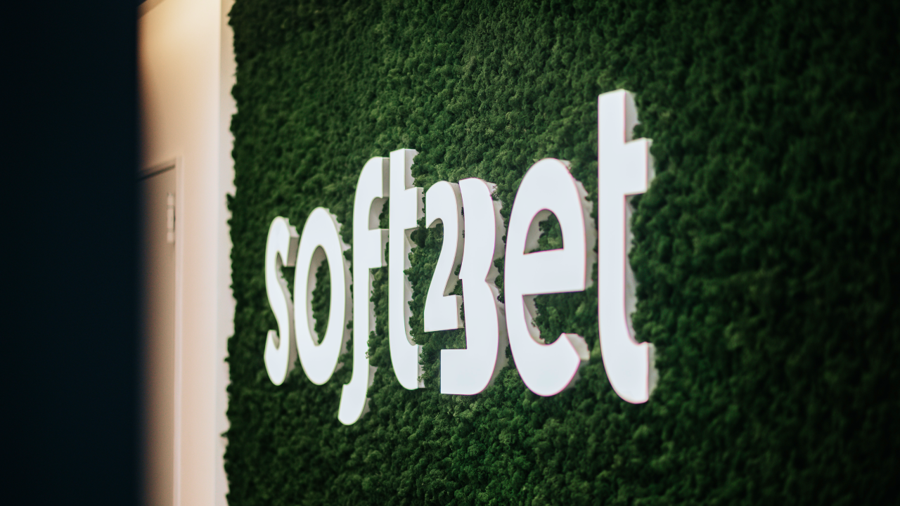 Soft2Bet Logo on Green Surface